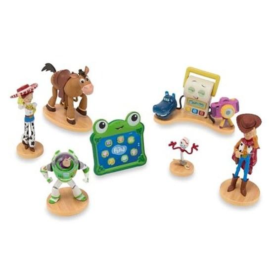 Disney Store official Toy Story 5 figure set includes fully sculpted figures Woody Buzz Forky Lily Pad Bullseye Jessie Tech Trio. Comes two-tier box