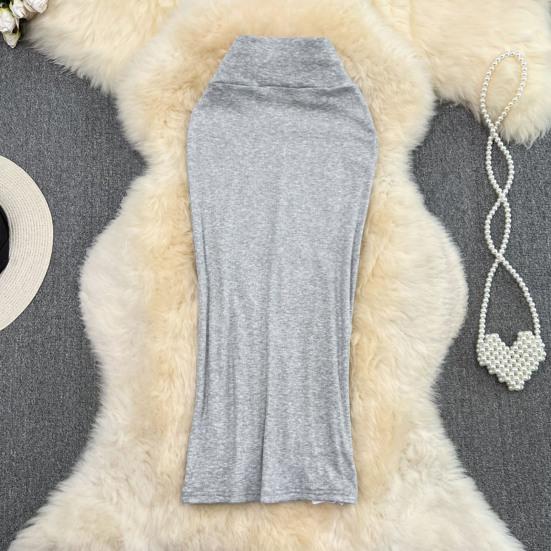 Dámská midi sukně jednobarevná s rozparkem vzadu, s vysokým pasem, rybího střihu, obepínající boky, do kanceláře, pouzdrová sukně