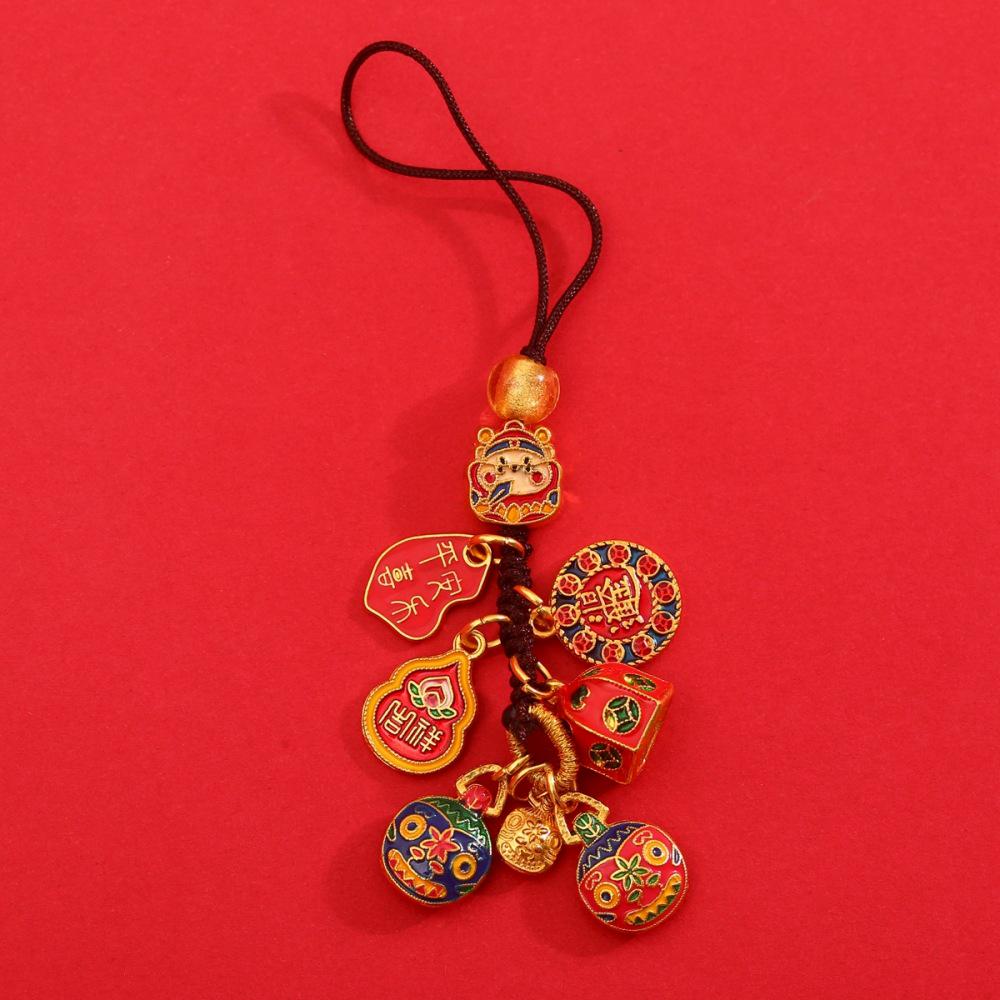 Goldener Glücksschlüsselanhänger: Reichtumsgott verschlingt Goldtier für Familie, perfekt als Auto- oder Handyanhänger.