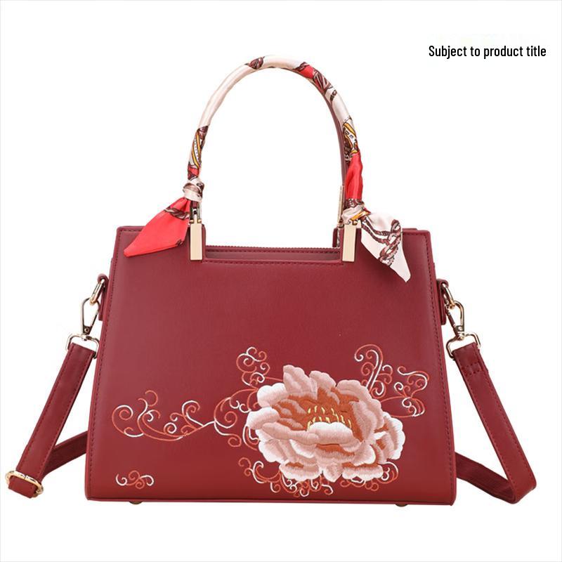 Элегантная женская сумка REWELL с вышивкой