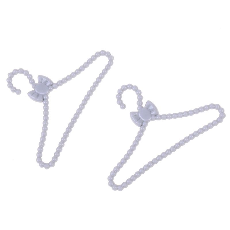 20Pcs Mini Grau Kleiderbügel Bowknot Design Puppenhaus Kleid Kleidung Zubehör