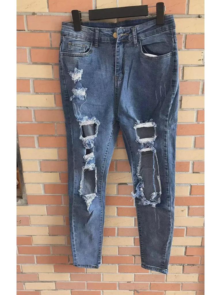2024 Early Spring European & American Internet Celebrity Casual Ripped Denim Pants with Fishnet Stockings for Women.