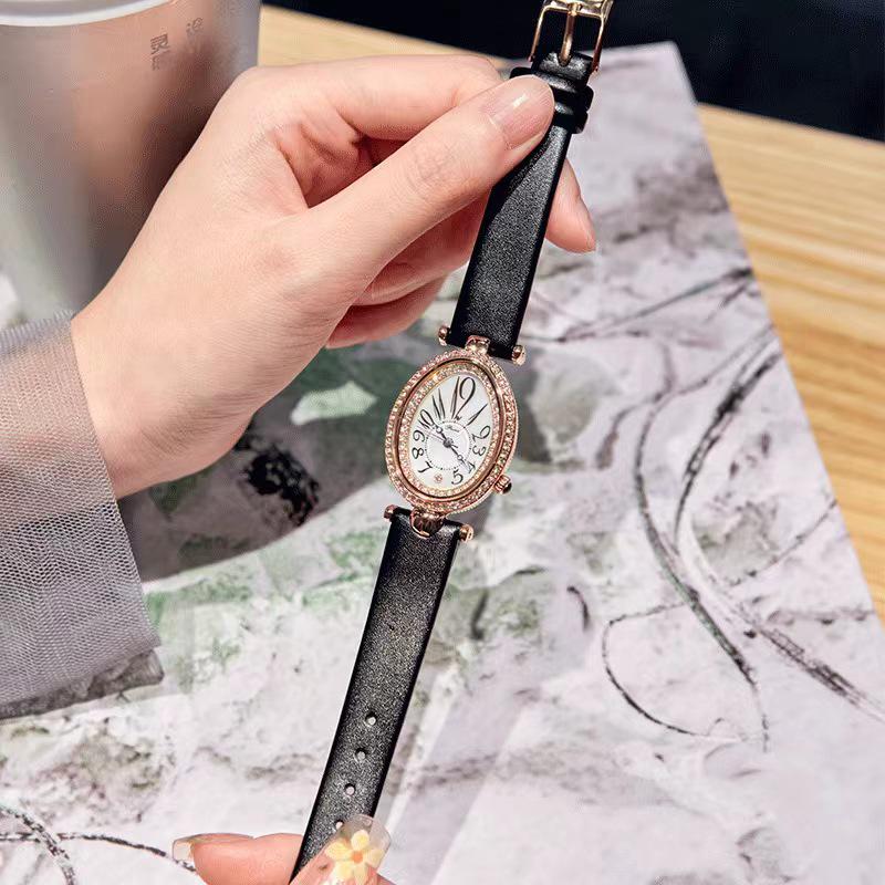 Women's Luxury Oval Leather Strap Watch with Diamonds