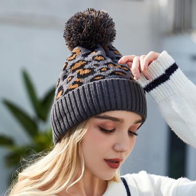 Europa und die Vereinigten Staaten Herbst und Winter Leopardenmuster Wollmütze Europäische Damen Wollknäuel Warme Strickmütze Einfache Mütze