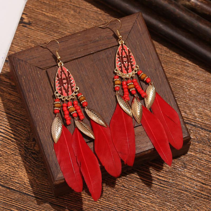 Bohemian Faux Silver Feather Tassel Mosquito Coil Earrings: Summer Retro Ethnic Ear Jewelry
