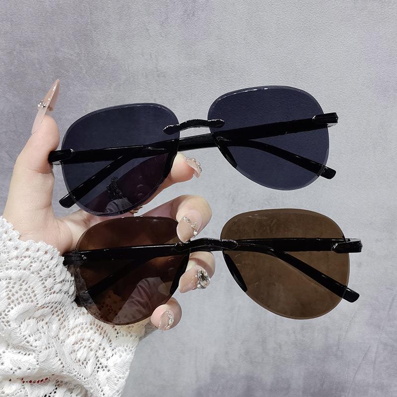 

2025 Frameless Aviator Men s High-End Anti-UV Sunglasses for Driving and Live Streaming Tea