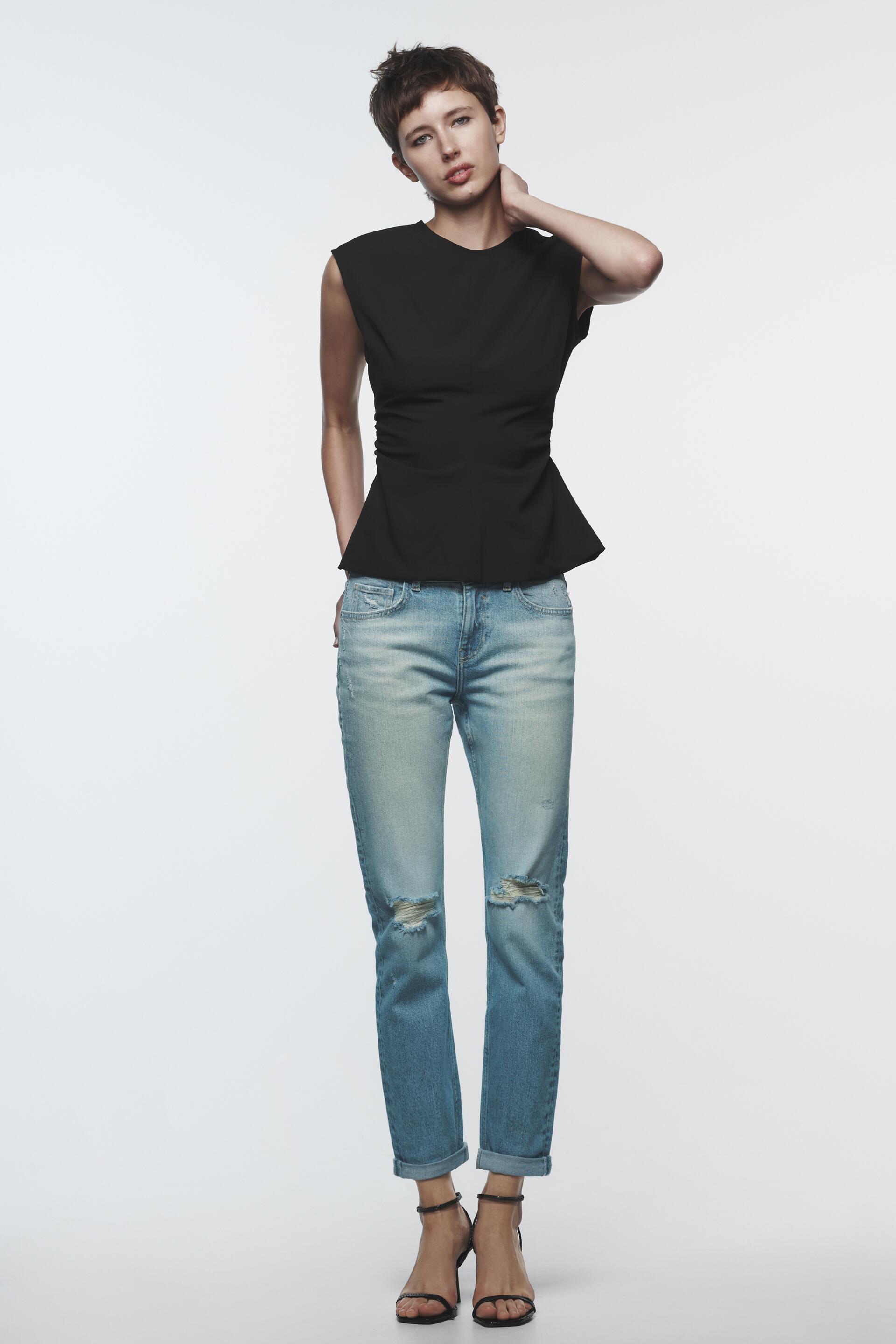 

Z1975 RIPPED SPLIT-HEM LOW-RISE JEANS