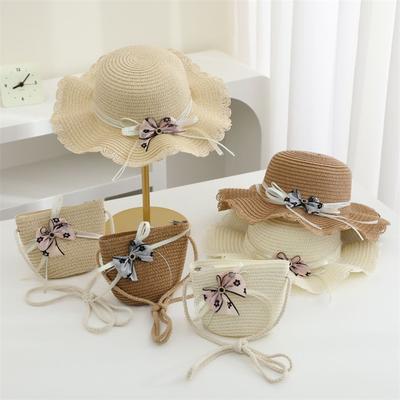 En yeni tatil çocuk kız hasır şapka ve çanta 2'li set çiçekli güneş şapkası bebek plaj Floppy Panama kep gorros omuz çantaları