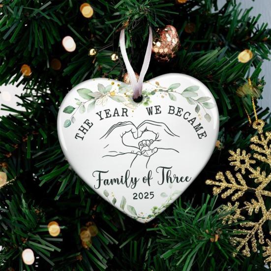 The Year We Become Family of Three Ornament Heart Shaped Baby First Christmas Ornament New Mom And Dad Gifts for Parents