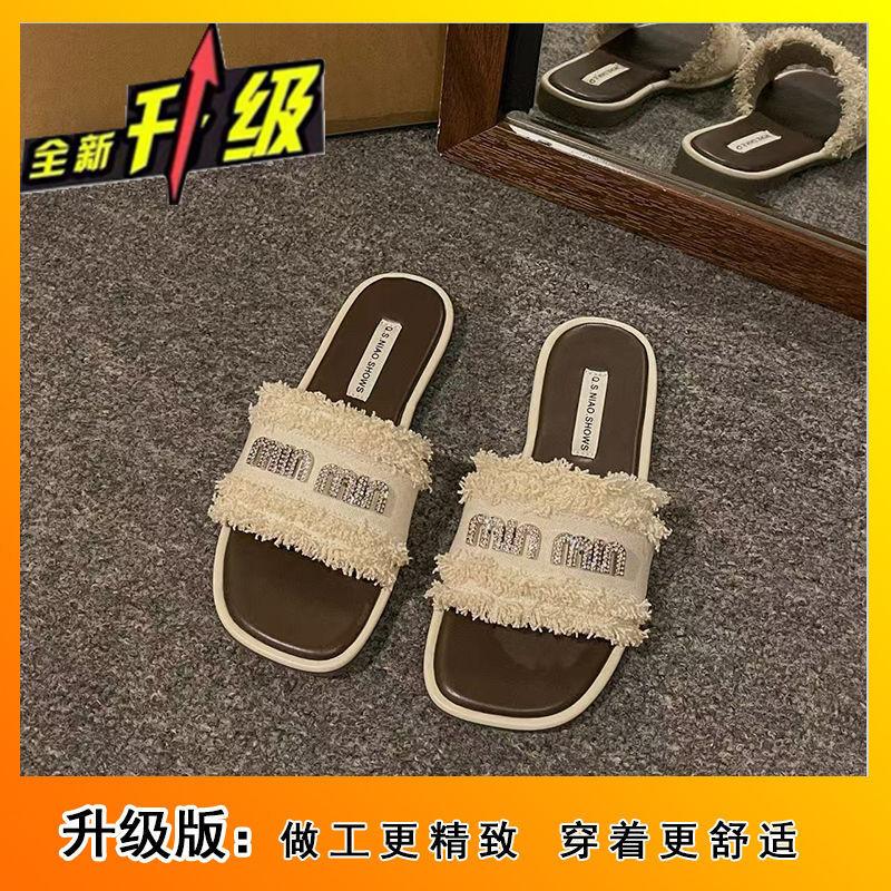 

2025 new pure desire style flat-bottomed slippers women s summer wear fashionable and versatile one-word drag high-end sense fairy wind beach 40