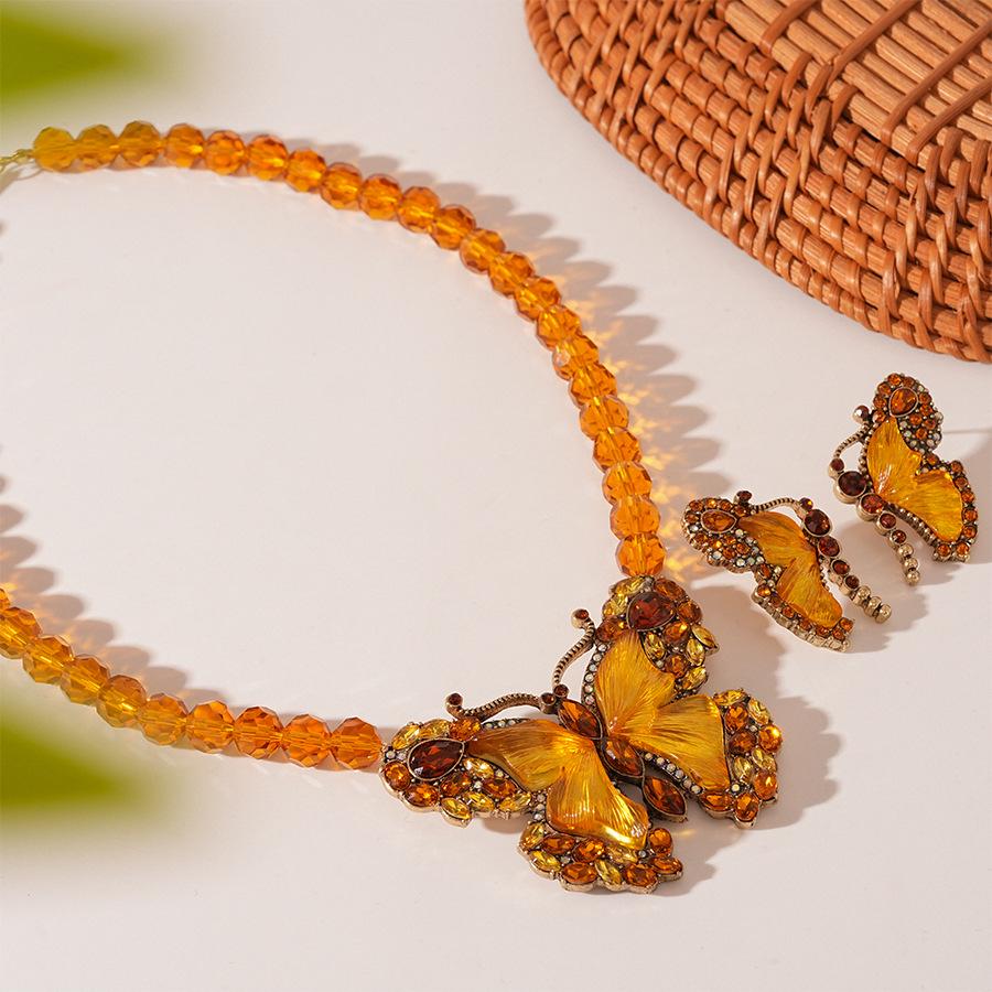 Maillard Glass Inlaid Diamond Butterfly Necklace: European & American Retro Niche Design for Women.