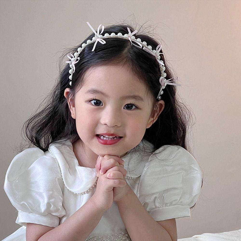 Bílý princeznovský vlasový obruč Roztomilá dětská čelenka Elegantní perlová mašle Vlasové pásky pro děti