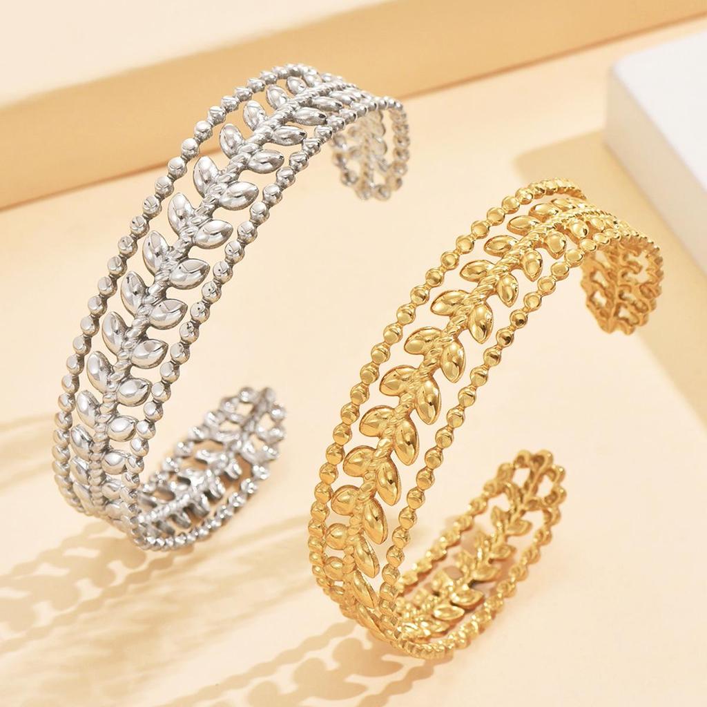 Elegant Hollow Leaf Open Stainless Steel Women's Bracelet with 18K Gold Vacuum Plating