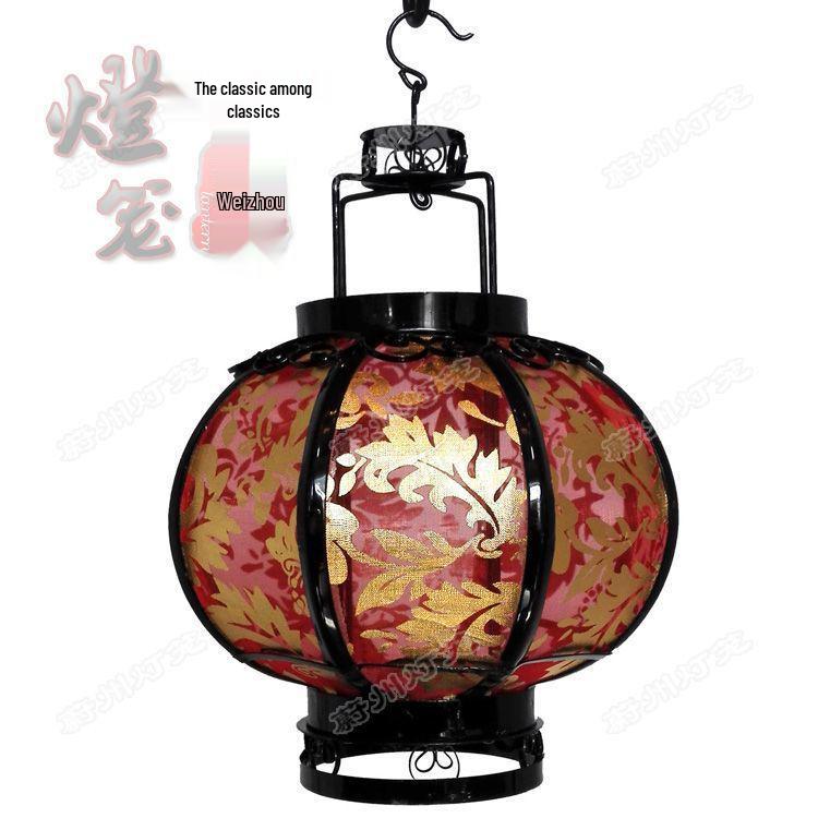 Retro Chinese Iron Art Lantern with Phoenix Tail Design