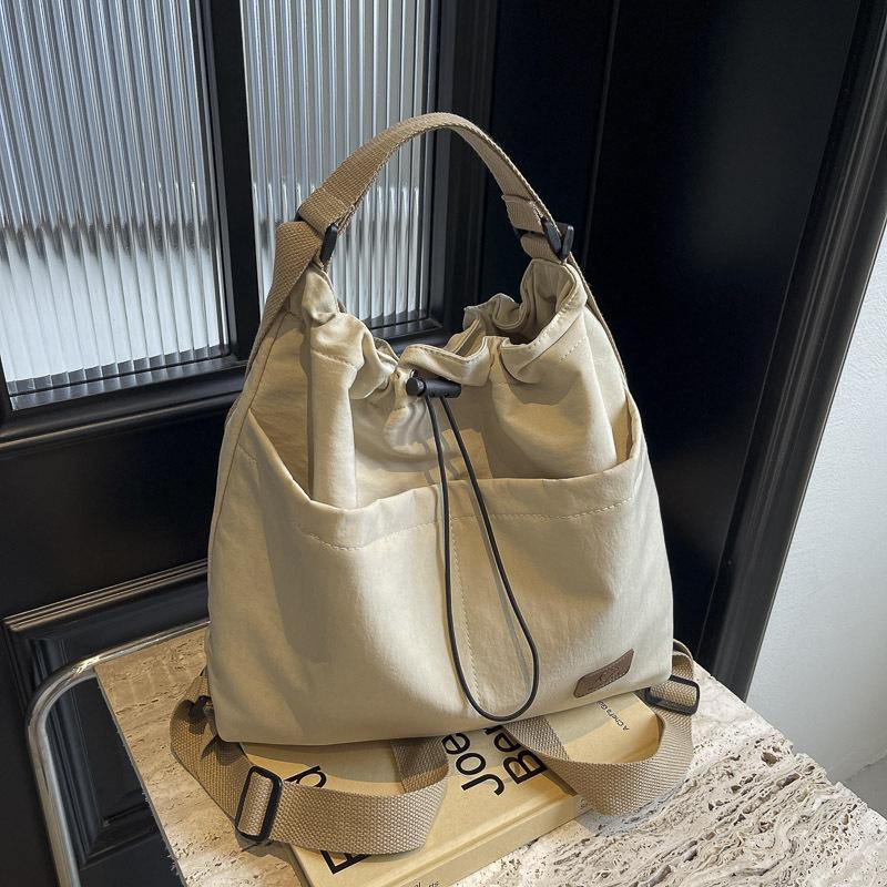 

2025 новая повседневная модная сумка-мешок с кулиской и плиссировкой на плечо большой вместимости для путешествий и отдыха, сумка-мессенджер для женщин