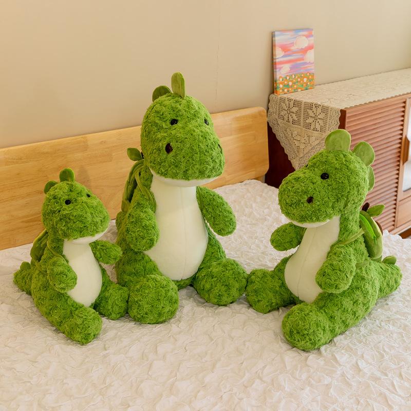 Nuovo peluche drago fiore spazzola morbido carino bambola dinosauro macchina bambola avocado carina regalo