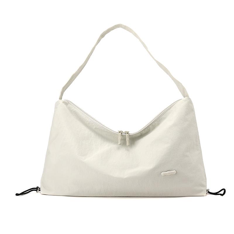 Korean style spring and summer new women's solid color high-end niche shoulder crossbody armpit bag