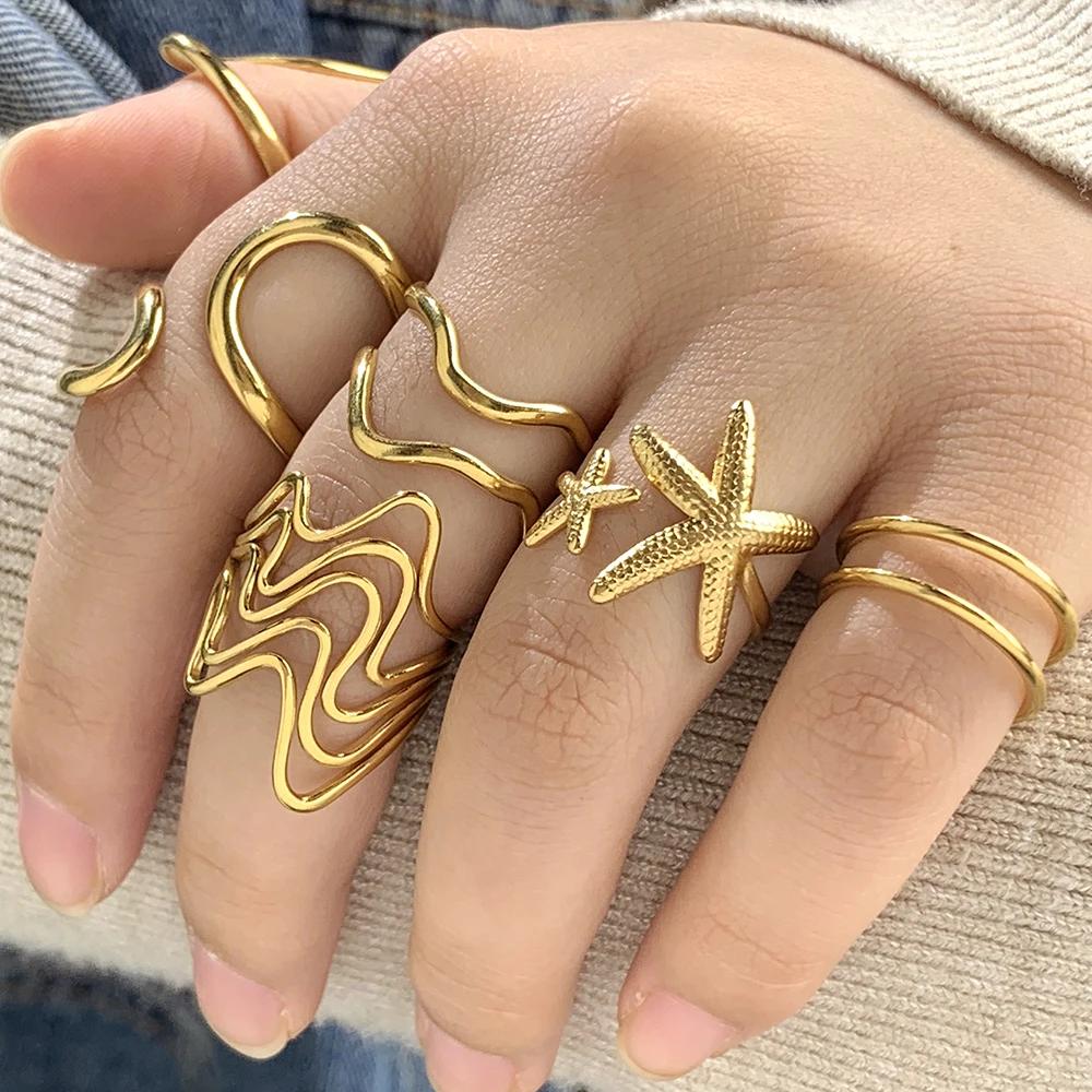 Europäische und amerikanische Damenringe aus Edelstahl, goldfarben und Zinklegierung, modischer, schlichter Stil, Zirkonia-Geschenk für Damen, Großhandel