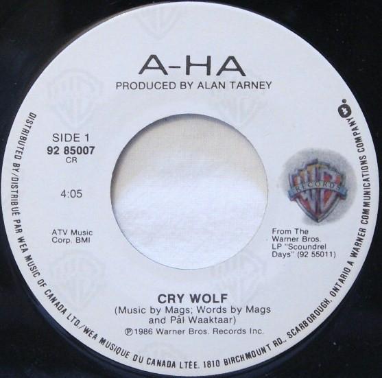 

7-дюймовая пластинка AHA Cry Wolf 9285007 WARNER BROS. RE 1986 Канада Танцевальная Электроника Б/У