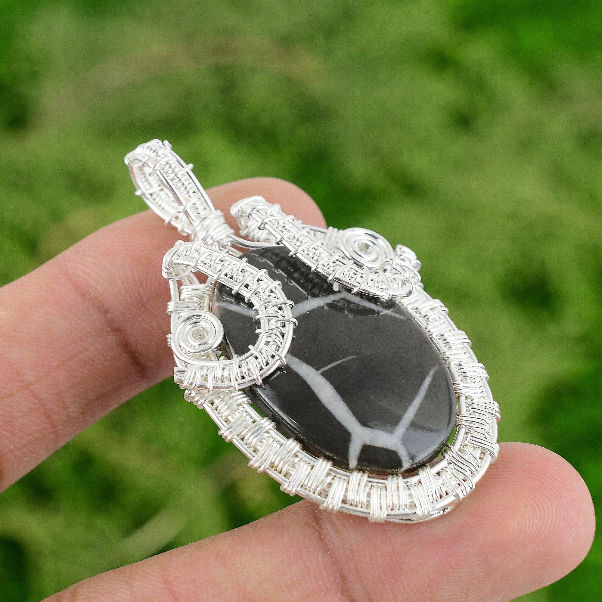 

Moroccan Mud Crack Fossil Gemstone Ethnic Wire Wrap Wife Pendant Sterling Silver