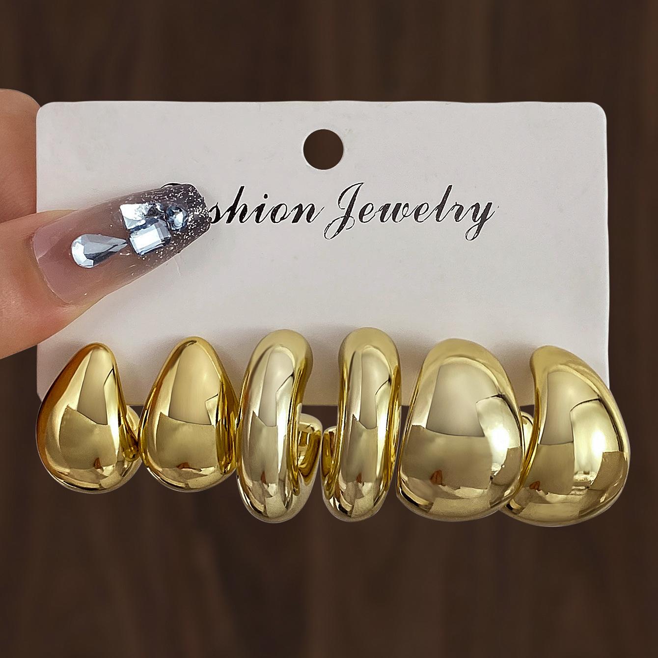 

Новые высококачественные золотые серьги с индивидуальным дизайном, преувеличенные серьги из сплава, креативный сложный комплект из 3 пар серег-закруток environmental protection