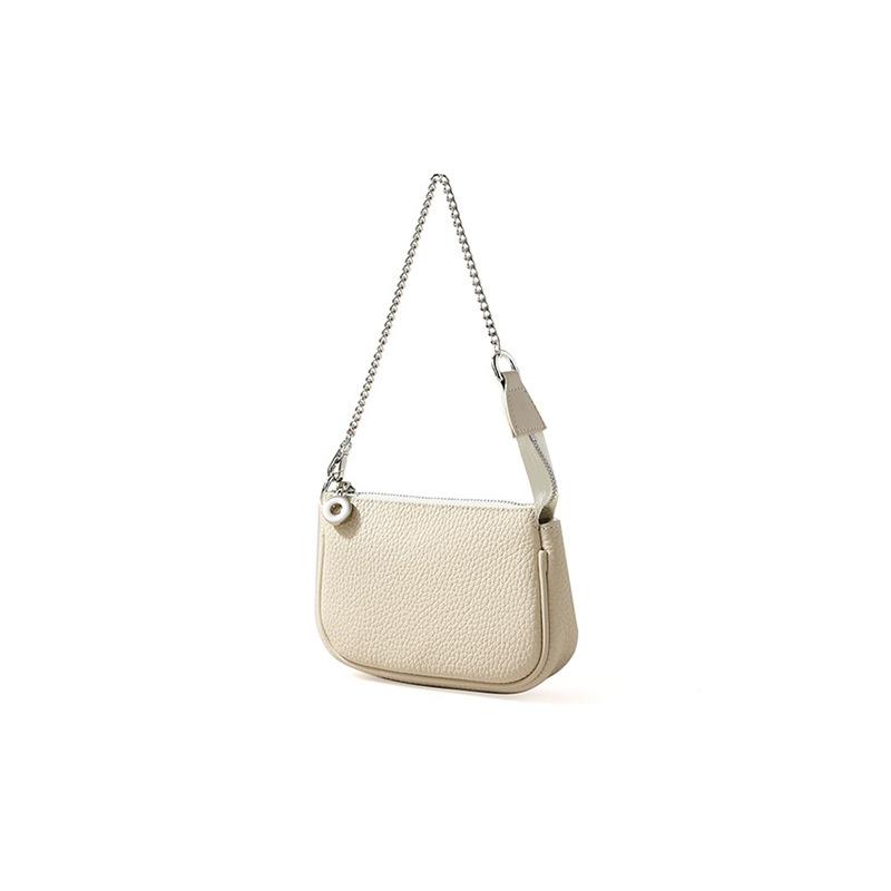 Niche cowhide handbag spring new metal chain design sense bag women's simple commuter versatile underarm bag