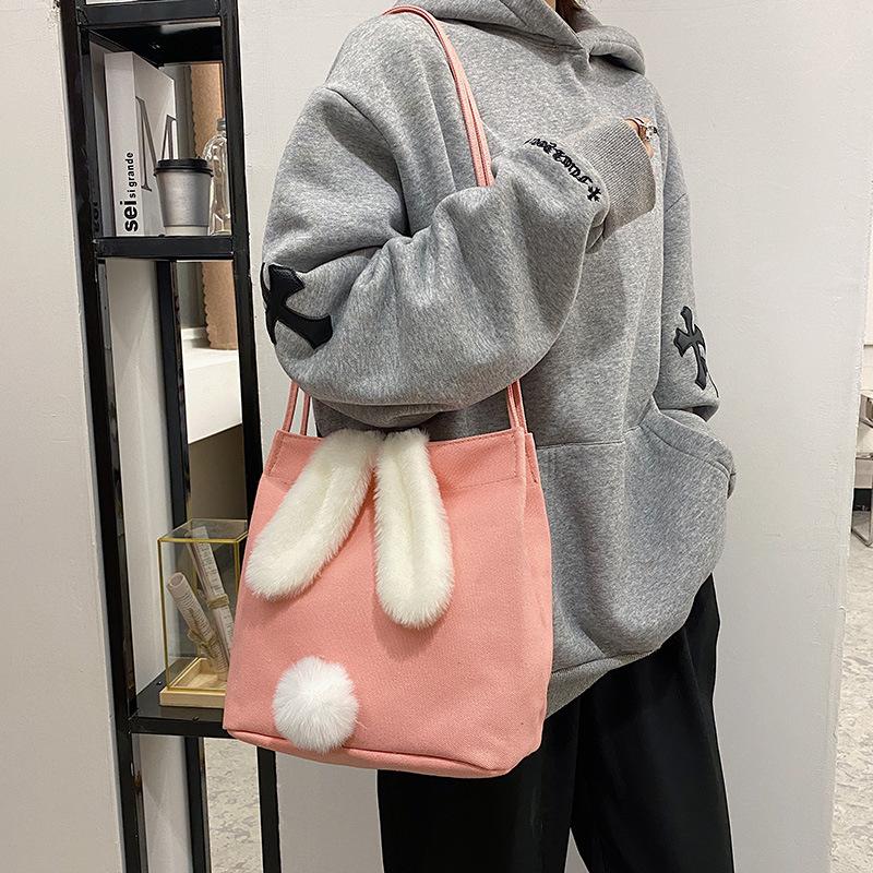 

Canvas bucket bag 2 new women s bag fashionable and sweet contrasting color shoulder handbag розовый