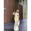 Urlaubsstil Träger rückenfreies Latzkleid Damen Sommer Blumenkleid Spice Girl Taille Fishtail Rock Hüftwickelkleid