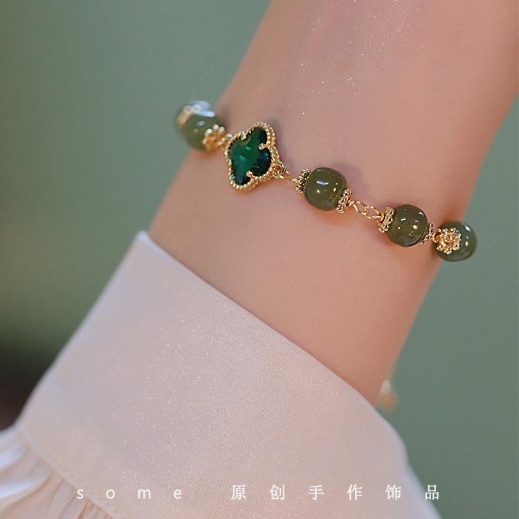 Clover*Hetian jade four-leaf clover bracelet, lucky niche design, new model that enhances complexion