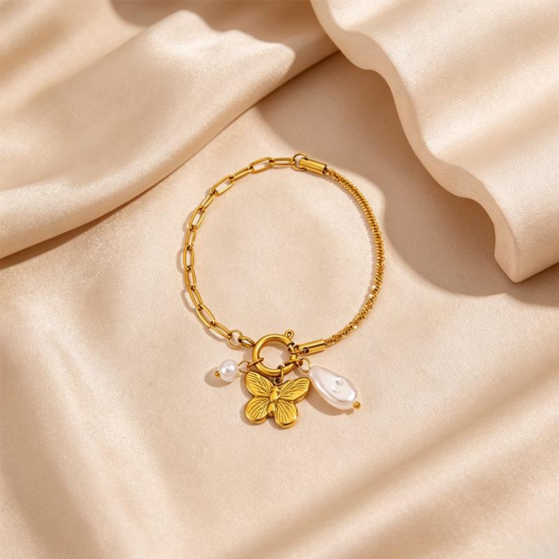 Women's European Retro Multi-Element Titanium Steel Bracelet with 18K Gold Plating and Pearl Accents