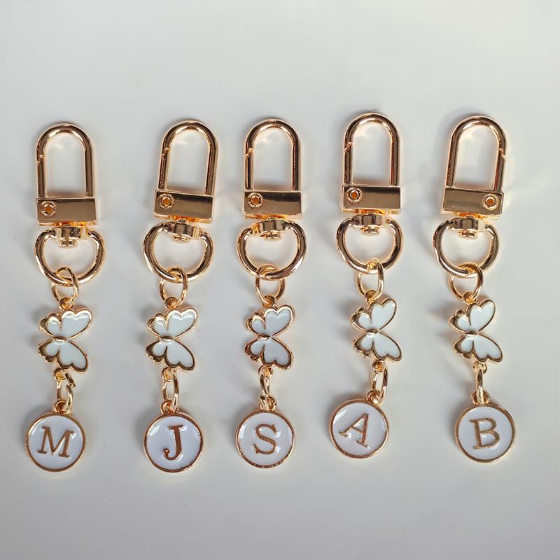 1 Stück Schlüssel-Logo Leichter Schlüsselanhänger Autoschlüssel Begleiter Taschenanhänger Langlebigkeit Metallschlüsselanhänger Monogramm-Anhänger Schmetterling Monogramm-Schlüsselanhänger
