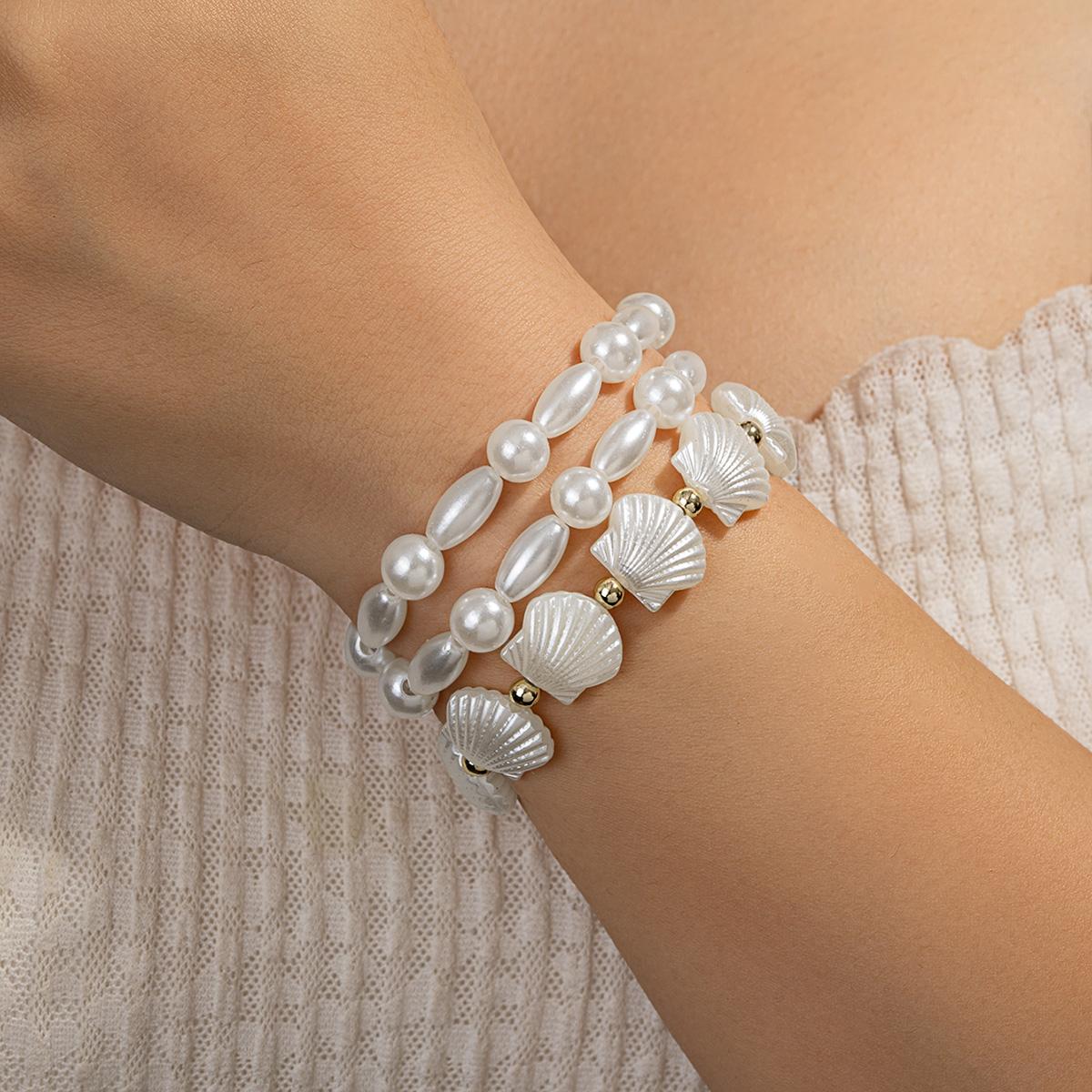 

Women s Bohemian Style Three-Layer Rice-Shaped Pearl & Shell Bracelet