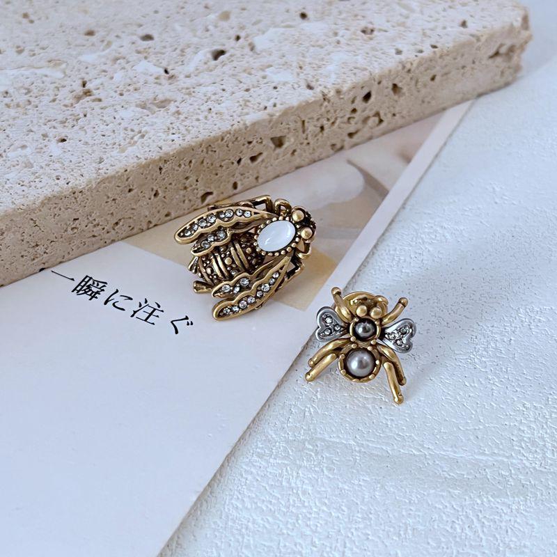 European & American Fashion Asymmetrical Matte Gold Rhinestone Spider Bee Stud Earrings