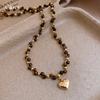 18k guldbelagd tigeröga sten pärlförsedd love-halsband lätt lyx nyckelbenskedja retro mångsidigt halsband damer