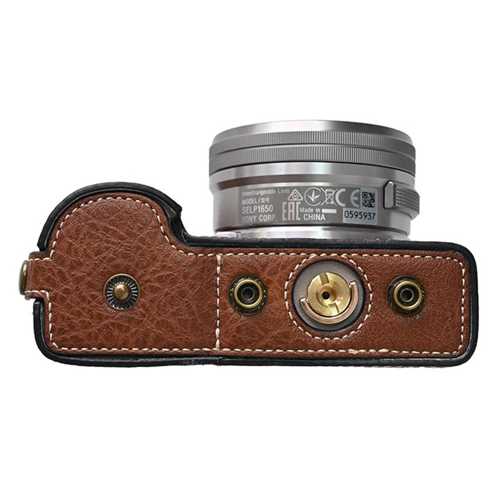 Pouzdro na fotoaparát Sony Alpha ZV-E10 Kožený kryt s texturou liči s otvorem pro baterii + Popruh