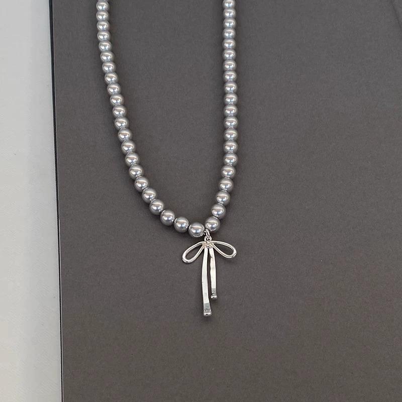 

Bow necklace grade cold gray pearl temperament fashion sweet collarbone chain design new sweater chain