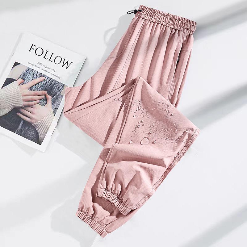 Pantalon de randonnée softshell coupe-vent et imperméable pour femmes de Bird, adapté aux sports de plein air et aux loisirs de printemps, d'automne et d'été.