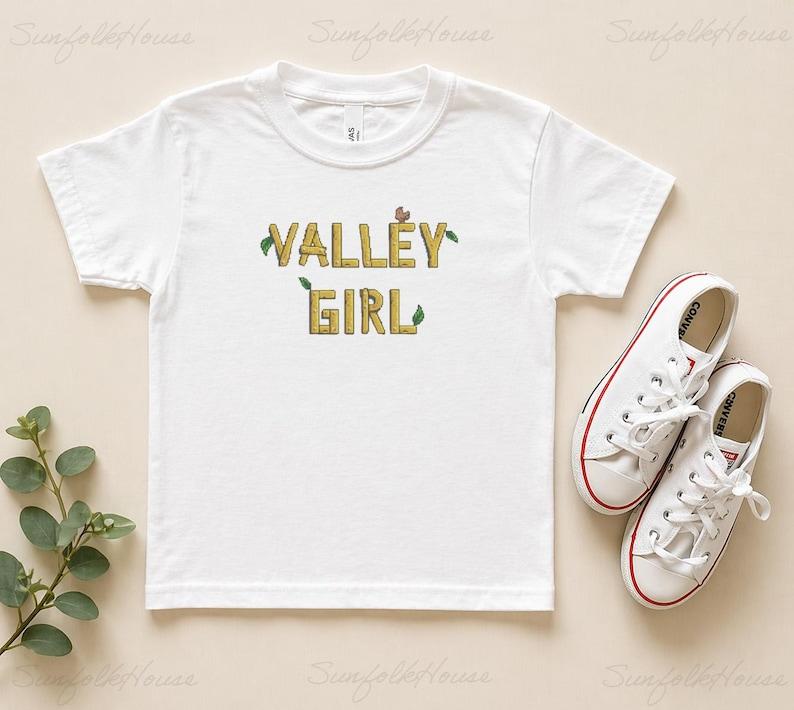 Valley Girl Kids Shirt, Stardew Valley Inspired Tee, Cute Gamer Girl T-Shirt, Cozy Farming Game Shirt, Pixel Art Kids Tee, Gift for Girls 110