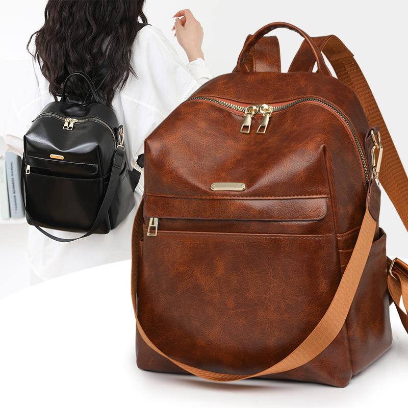 Retro soft leather backpack women's new fashion trend backpack student simple shoulder travel bag