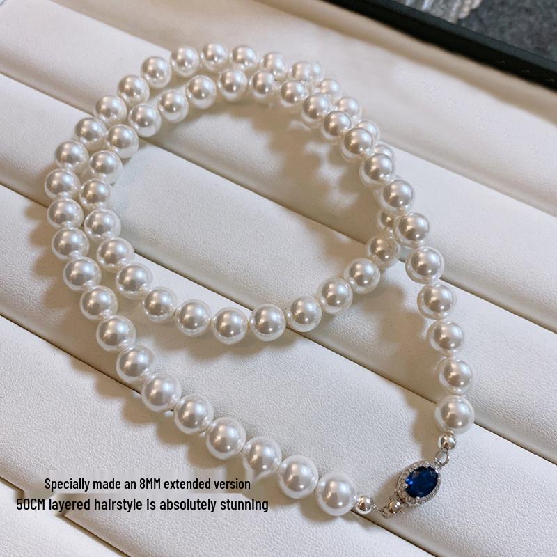 Natural Mother-of-Pearl Necklace with 925 Silver Sapphire Clasp, High Luster Shell Pearls, and Australian White Pearls.