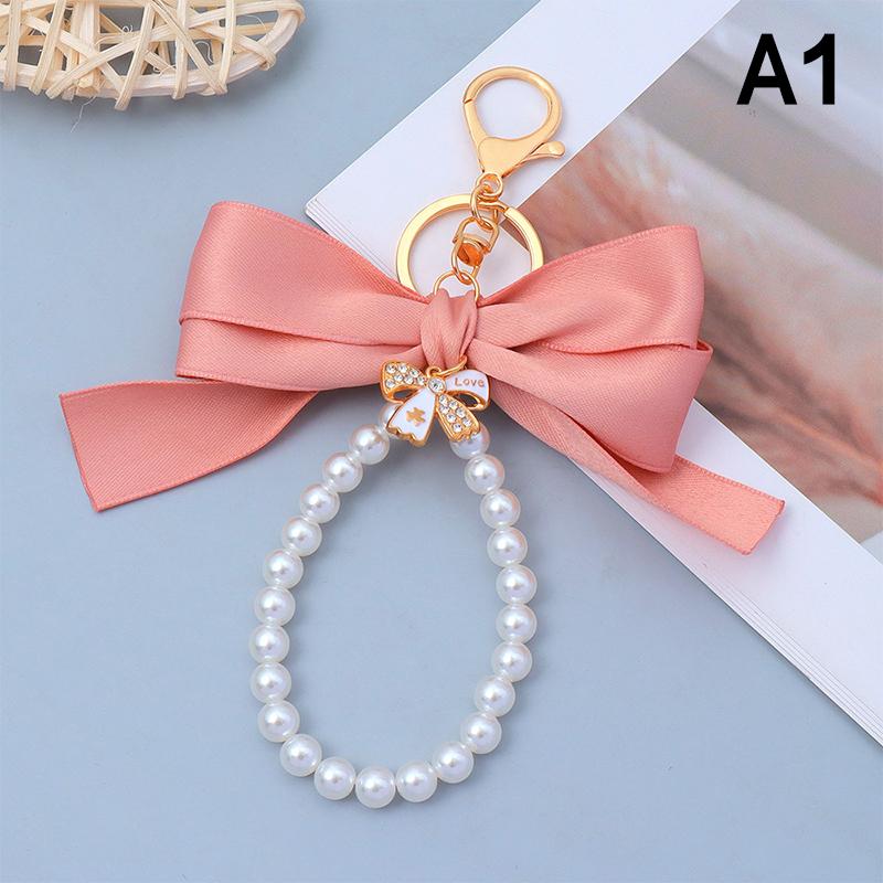 

Креативный брелок для ключей с большим бантом, жемчужная цепочка, женский кулон для сумки, брелок для ключей от машины, подвеска для сумки-тоут