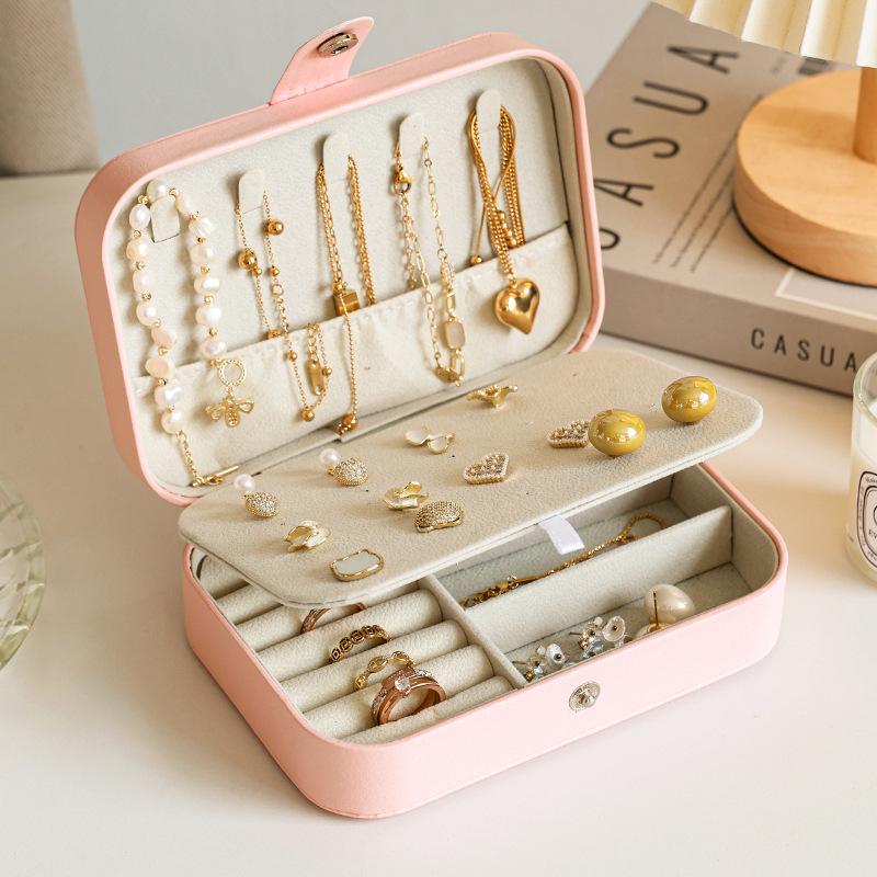 Portable Multifunctional Jewelry Storage Box: Dustproof & Anti-Oxidation for Earrings, Rings, and Bracelets.