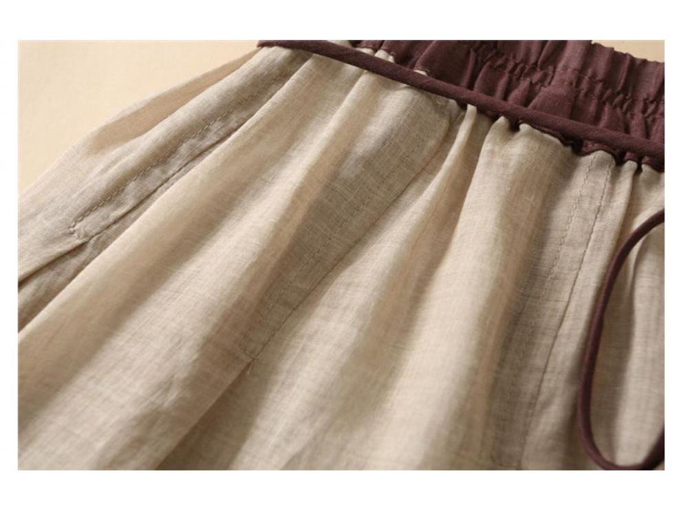 Letní midi sukně s vysokým pasem a strečem s plisovaným designem a třásněmi 2025