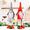 Delightful Wine Christmas Bottle Cover With No Face Doll And Hanging Legs Festivity For
