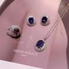 Elegantes lila Zirkonia Schmuckset: Ohrstecker, Halskette und Ring für Damen