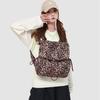2025 Retro Leopard Print Women's Canvas Backpack: Autumn/Winter College-Style, Large Capacity Casual Bag