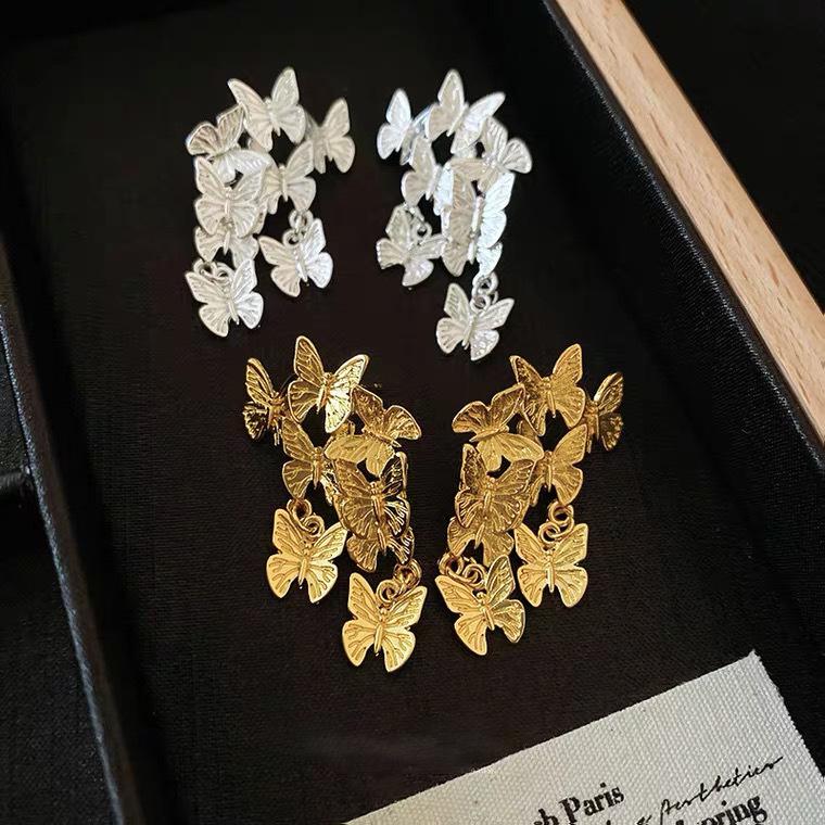 2024 Trendy French Retro Butterfly Tassel Earrings: Elegant Metal Studs