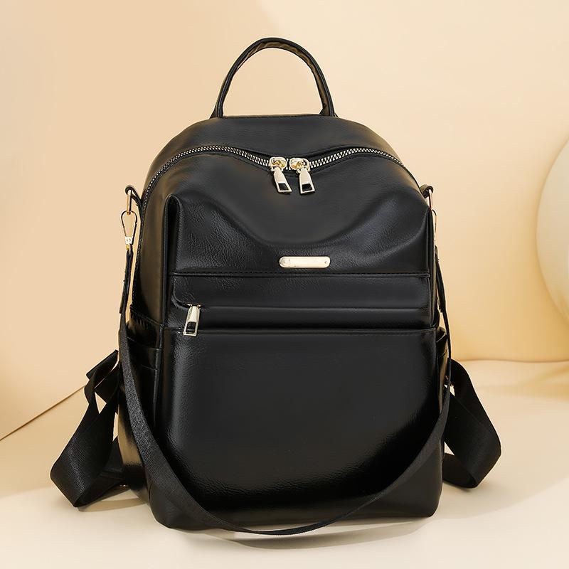 Retro soft leather backpack women's new fashion trend backpack student simple shoulder travel bag