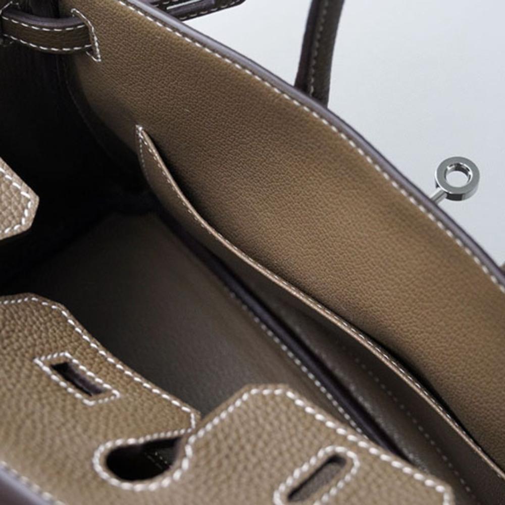 Høykvalitets spesiallaget semi-vokset tråd semi-håndsøm stålbeslag importert togo toppnarvet kuskinn håndveske med en følelse av luksus