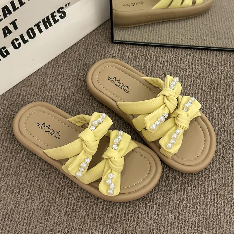 

Нежный бант красивые крутые тапочки женские летние новые с юбкой пляжные мягкие на плоской подошве тапочки на одно слово 40 жёлтый